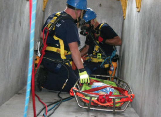 Rescue worker trainers performing training.